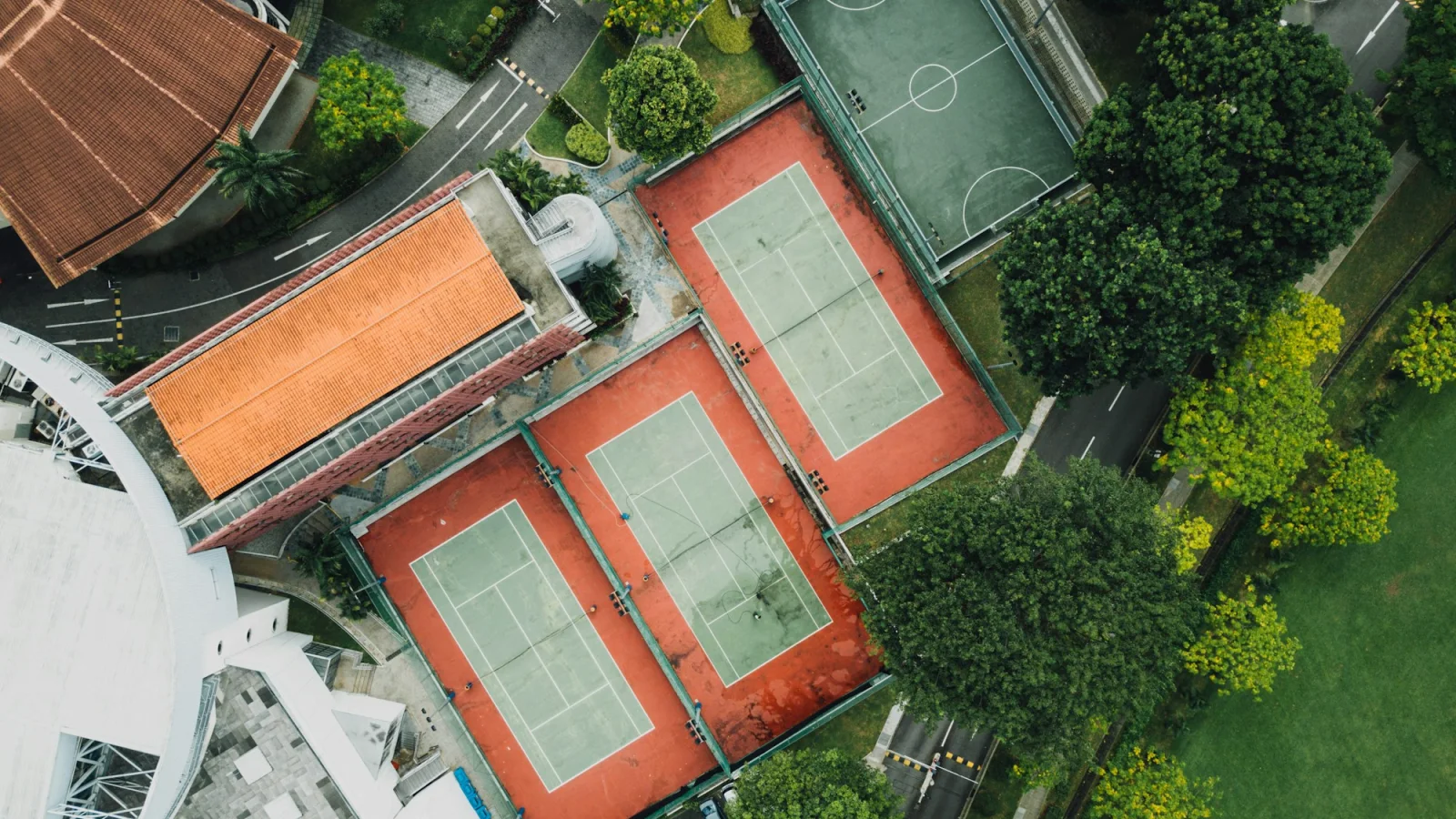Aerial view of football, tennis and basketball sports courts
